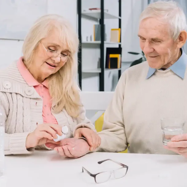 Senior couple taking brain health supplements like Astaxanthin for memory support and cognitive clarity - Save your Brain Health