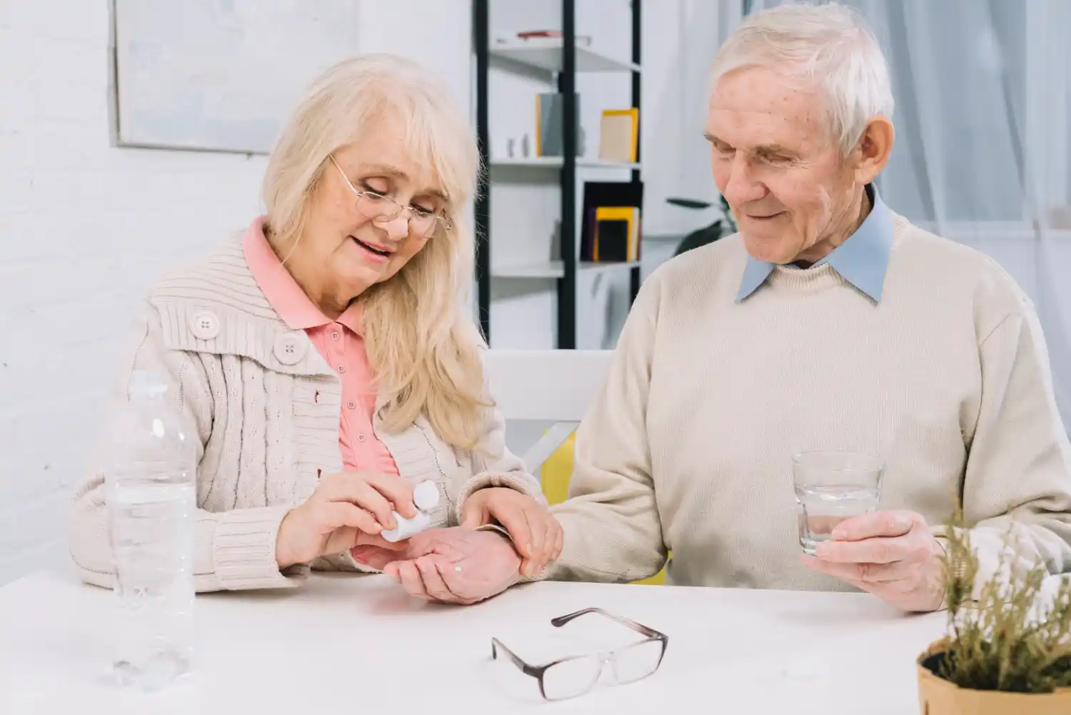 Senior couple taking brain health supplements like Astaxanthin for memory support and cognitive clarity - Save your Brain Wellness