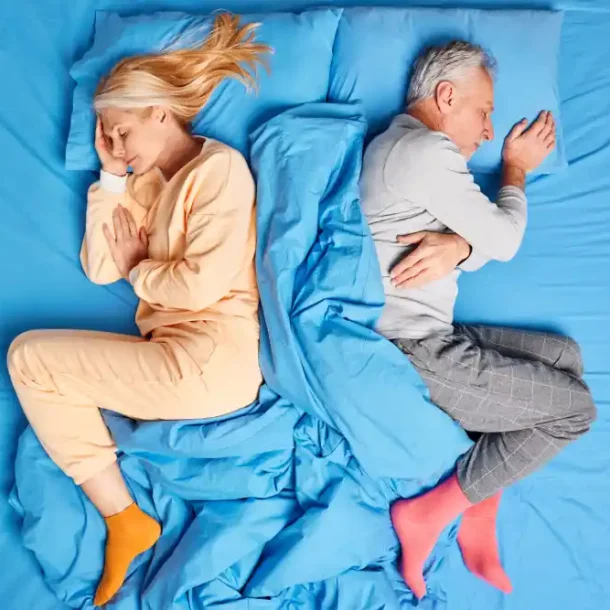 Sleep isn't just rest—it's reprogramming. As you drift off, your brain enters a theta state ideal for subconscious healing, as shown by this peaceful sleeping couple.
