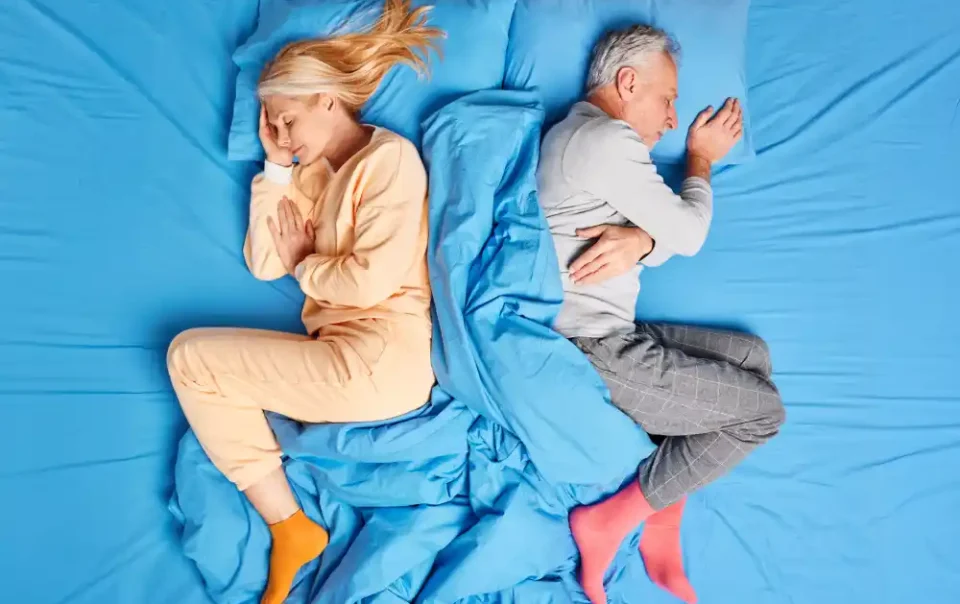 Sleep isn't just rest—it's reprogramming. As you drift off, your brain enters a theta state ideal for subconscious healing, as shown by this peaceful sleeping couple.