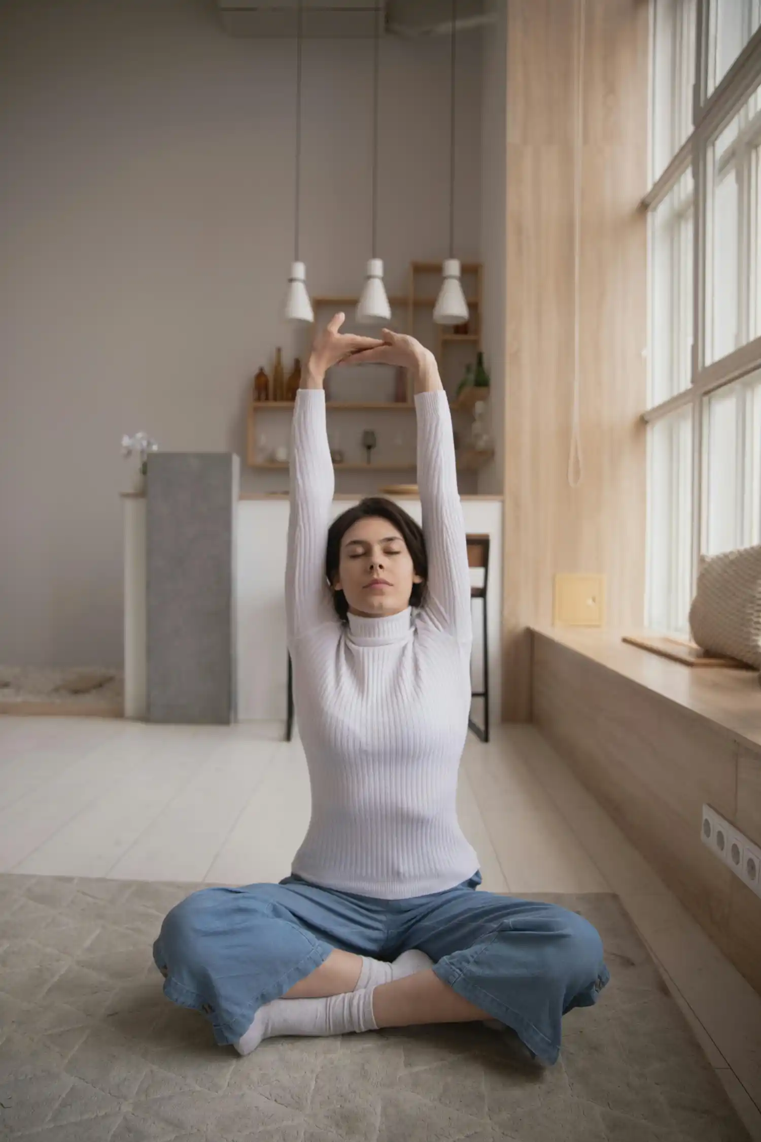 A Young Girl practicing deep breathing to reduce stress using a science-backed technique - Save your Brain Wellness