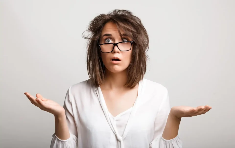 Woman feeling confused, illustrating emotional overwhelm and decision-making struggles.